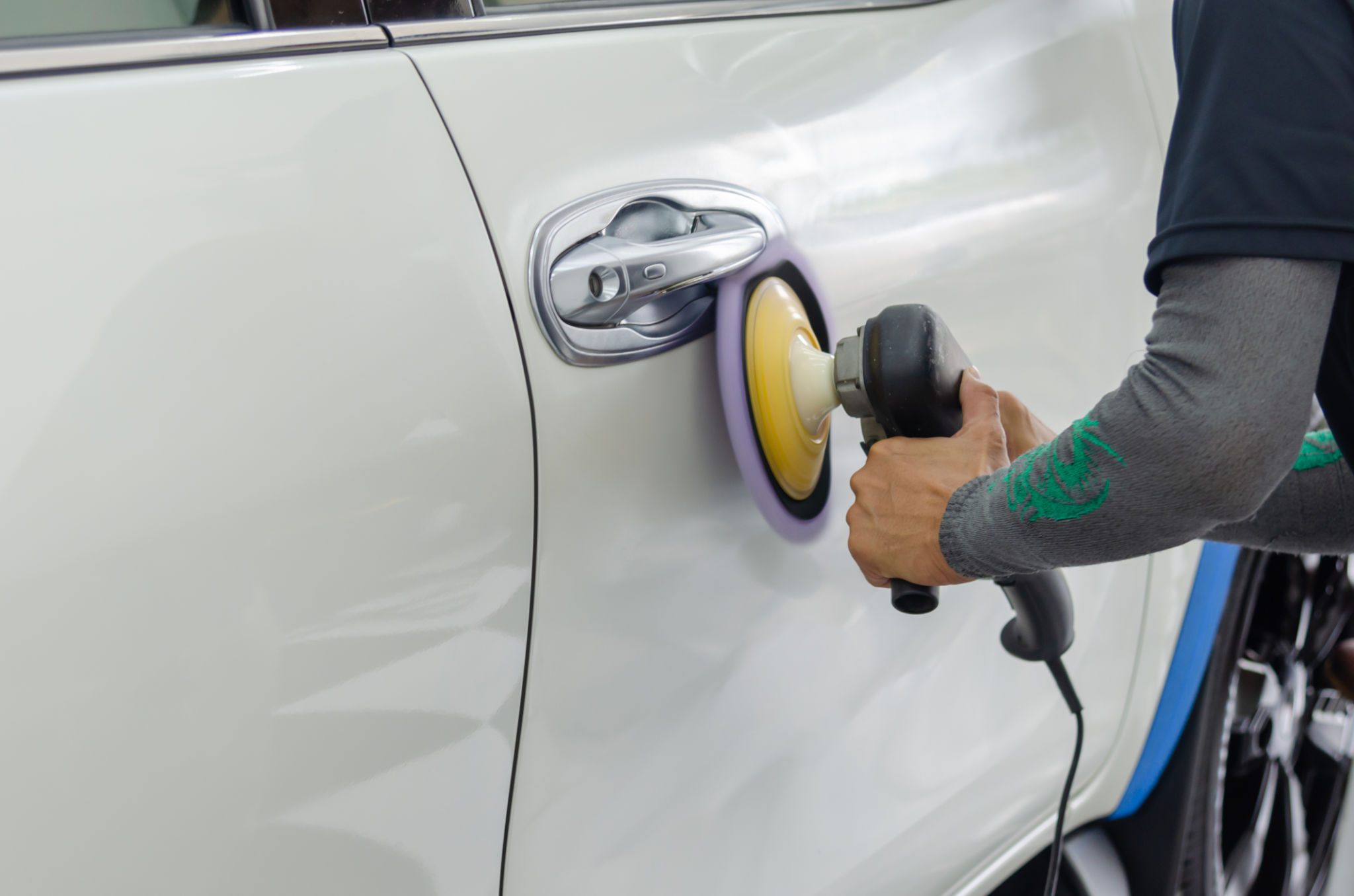 Professional auto detailing professional is cleaning car interior